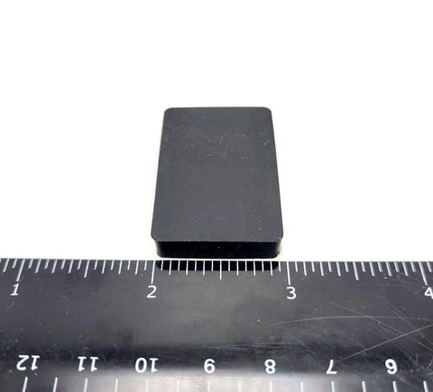 Rectangle Silicone Rubber Bumper Feet One And One Half Inch By One Inch Three Sixteenth Inch Thick with ruler for size reference