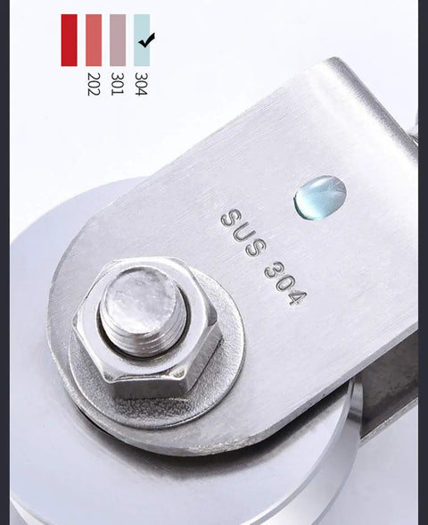 Close-up of Built Like A Tank Heavy Duty Roller Wheel Duo 304 Stainless Steel Track Pulleys showing SUS 304 label and hardware.