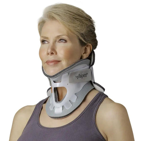 Woman wearing Cervical Collar Neck Brace For All Day Comfy And Solid Support Regular Size Easy On Off Adjustable Fit Lightweight Breathable Foam Pad
