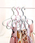 Fan Shaped Closet Rod Organizer For Ties Scarves And Hats Made From Sturdy Polypropylene, holding scarves on a rod.