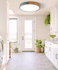 Sleek Modern Round Wood LED Ceiling Light 15.8 Inch Flush Mount Fixture in gray installed in bright laundry room