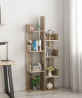 Cactus Shaped Four Tier Bookshelf With Open Cube Shelves Standing 61.4 Inches Tall in room with books and decor
