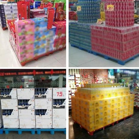 Blue Plastic Pallet Pair Mesh Nine Leg Design Forklift Ready Heavy Duty Storage Platform with stacked boxes in a store.