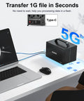 Plug And Play Heavy Lifter Four Bay Sata Storage Enclosure For 2.5 And 3.5 Inch Drives With Chill Operating Fan, Usb C 3.1 Ports, Seven Quick Swap Raid Modes, And Rock Solid 96 Terabyte Bulk Capacity For Your Tech Rig connected to a laptop on a desk.