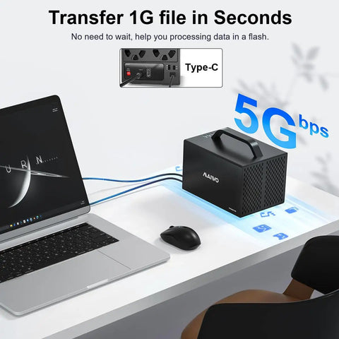 Plug And Play Heavy Lifter Four Bay Sata Storage Enclosure For 2.5 And 3.5 Inch Drives With Chill Operating Fan, Usb C 3.1 Ports, Seven Quick Swap Raid Modes, And Rock Solid 96 Terabyte Bulk Capacity For Your Tech Rig connected to a laptop on a desk.