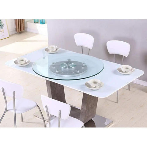 Dining table featuring Tempered Glass Swivel Turntable For Dining Table Lazy Susan Rotating Tray High Temperature Resistant With Dope Sturdy Plastic Steel Base Gold Or Silver Finish Large 31 To 47 Inch Options Ideal For Hotels Banquets Home Dining with white chairs and dishes.
