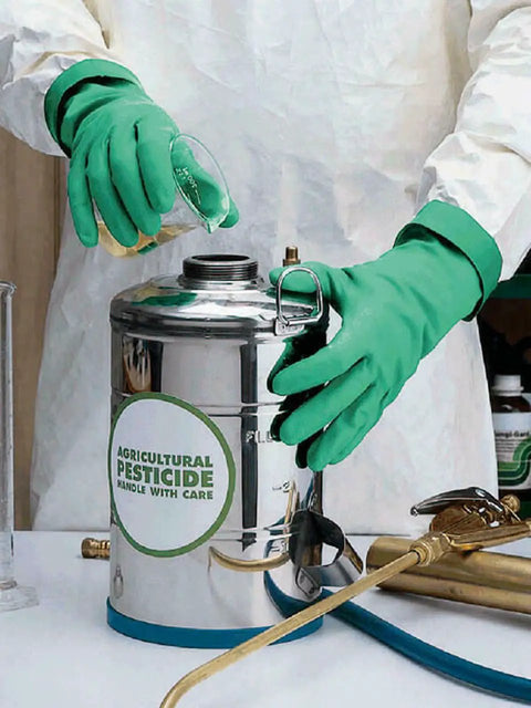 Heavy Duty Chemical Resistant Nitrile Gloves With Cotton Flock Liner in use with pesticide sprayer, hands visible, green, medium
