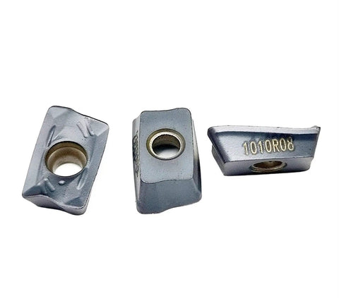 Three Heavy Duty Indexable Carbide Lathe Tool cutting blades R390 11T308 for external turning steel machining.