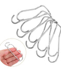 Plant Trellis Buckles 50 Pack For Garden Fences And Climbing Plants Quick Install And Easy Removal Clips shown in hand.