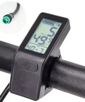 KT LCD4 Display Mini Meter For Electric Bikes on handlebar, speedometer, odometer, waterproof 5 pin connector inset.