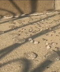 Water beads on concrete showcasing Ultimate Sealant Invisible Water Repellent Coating for Concrete and Masonry Porous Surfaces SiO2 Nano Based Water Based Fast Curing 1 Gal Long Lasting Protection that Keeps Texture and Color Unchanged