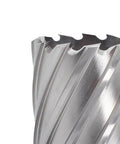 Annular cutter close-up: silver 2-1/8 in diameter with sharp cutting teeth
