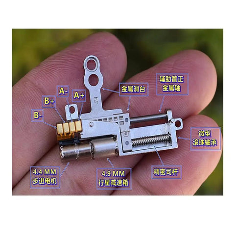 Close-up of compact 11mm Stroke Linear Actuator With 5V 2-Phase 4-Wire Stepper Drive, showing metal gearbox and precision components