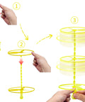 Demonstration of using 50 Pack Flying Disc Toy Set With Swirly Sticks, Spinners, And Rings, Easy Pull And Fly Action, for kids.