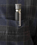 Pocket-sized HVAC Multi Bit Pocket Screwdriver 3in1 with Phillips Slotted and Schrader bits, concealable tip and clip, in shirt pocket.
