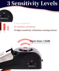 Front view of Amazon Door Stop Alarm wedge, black floor doorstop with 120dB siren and H/M/L sensitivity, pack of 2