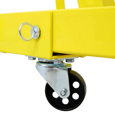 Close-up of smooth rolling caster wheel on No Fuss 2 Ton Folding Engine Hoist With Hella Durable Steel Boom and yellow finish.