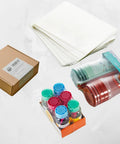 8X12 Inch Odorless Heat Shrink Wrap Bags 500 Count With Vents Hella Thick 100 Gauge PVC Film used for packaging and securing multiple items.