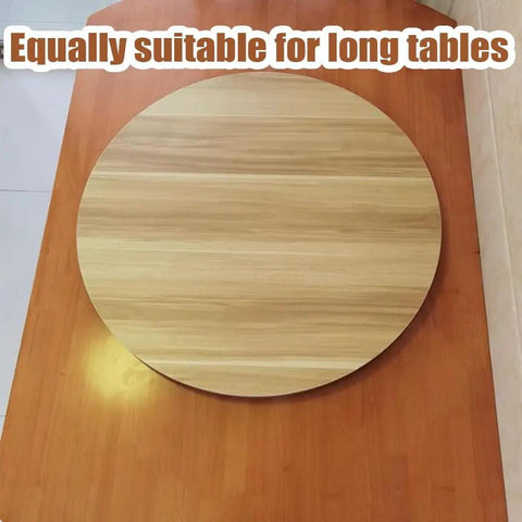 Built Different Wooden Lazy Susan Turntable With 360 Smooth Swivel Rotation For Dining Tables Kitchen Islands Black Serving Tray on a long table.