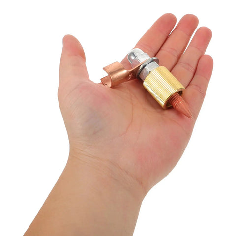 Hand holding Welding Ground Clamp Assist Holder Two Pack With Flexible Compact Design And Copper Alloy Base for repairs