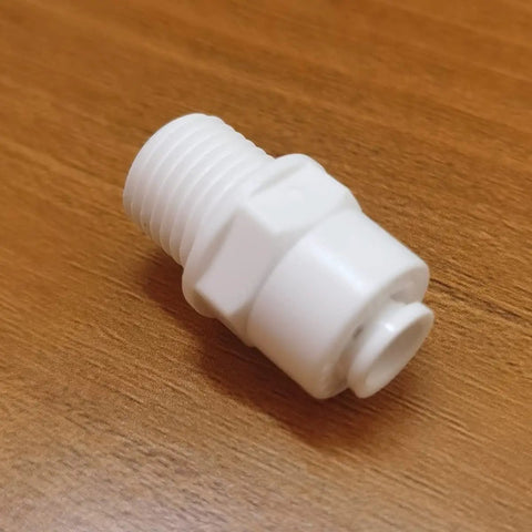 Push To Connect Tube Fitting One Quarter NPT Male To One Quarter OD Tube Quick Connector For Water Purifiers And RO DI Filtration Systems White 10 Pack Easy Install Durable Construction For Home And Industrial Use on wooden surface