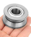 Heavy Duty Workhorse V Groove Track Roller Guide Bearing With 41ZZ Sealed Ball Design At 15X41X20MM in hand showing steel material.