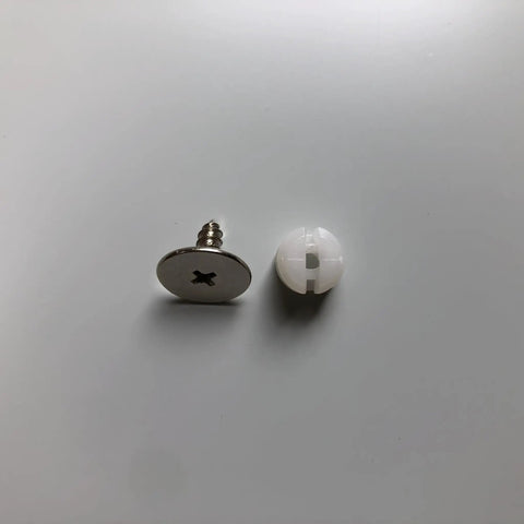 Set Of Three Push To Open Cabinet Latches With Silent Magnetic Catch For Dead Simple Drawer Opens Light Finger Tap Action Silver Kitchen Hardware Upgrade. Close-up of metal latch and white plastic component.