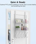 Over The Door Coat Rack With Mesh Basket And Detachable Storage Shelf, white finish, mounted on door, holding bottles and frames