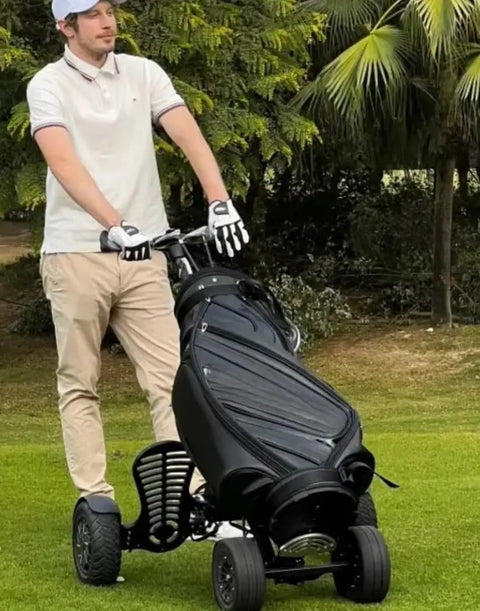 Electric Four Wheel Foldable Golf Cart Trolley With Easy Push Or Ride Options In Classic Black Trim for course transportation.