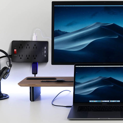 Heavy Duty Power Strip With USB C And Two USB A Ports, 12 AC Outlets, setup on home office desk with monitor and laptop