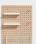 Pegboard with mounted shelves, hooks, and basket for Two Pack Adjustable Iron Storage Hooks Heavy Duty Pegboard Tool Hangers For Garage Workshop Home Office Organization.