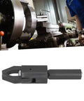 Beefy Alloy Steel CNC Bar Puller For Lathes with hardened handle and integrated jaws, shown in workshop setting.