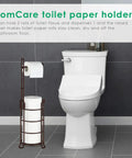 Must Have Bronze Standing Toilet Paper Holder And Dispenser With Mega Roll Capacity next to white toilet in bathroom