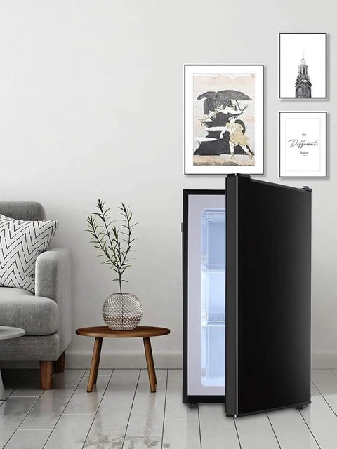 Compact 3.2 Cu Ft Upright Mini Freezer With Smooth Glide Shelves For Stashing Frozen Meats And Beverages In Tight Squeeze Apartments Or Offices Without Any Fuss Or Hassle in modern living room decor.