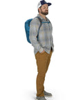 Man modeling Ultralight 20L Dry Stuff Pack for Travel and Quick Day Trips with Roll Top Waterproof Closure, blue backpack, side view