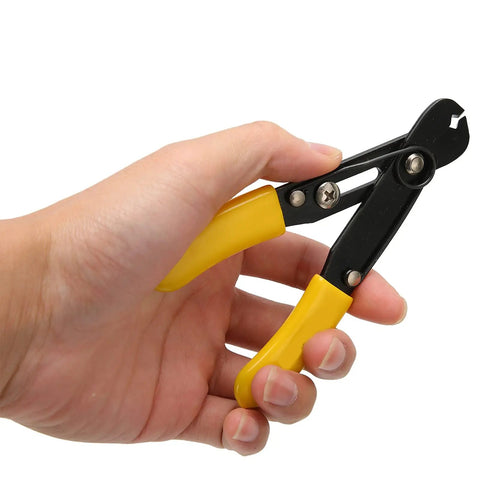 Hand holding Heavy Duty Rock Solid Electrician Wire Stripper Featuring Comfortable Grip And Spot On Single Hole Cutter.
