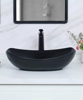 Black ceramic vessel sink on white countertop with faucet, modern design for stylish homes, not matching focus keyword provided.