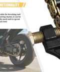 Close-up of Beefy Heavy Duty Motorcycle And Bicycle Chain Breaker Tool with Riveting Pin breaking a chain on a motorcycle.