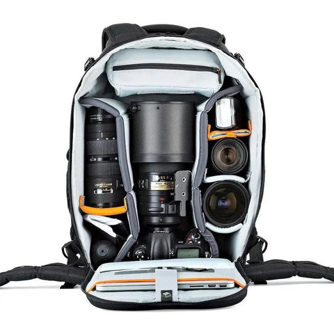 Open Flipside 500 AW II Camera Backpack showing organized space for DSLR, lenses, 400mm lens, and accessories.