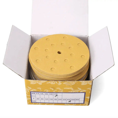 Heavy Duty 6 Inch Hook and Loop Sanding Discs With 15 Holes For Quick Dust Collection aluminum oxide pads in a box.
