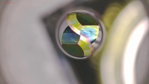 Close-up of WEXWE ball-nose carbide end mill, 1/4 inch shank, DLC coating, 2-flute CNC cutter.