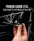 Hand holding 12 In 1 Bike Multitool Kit Lightweight Stainless Steel Bicycle Tool with Hex Key and Screwdriver against bike background