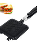 Durable Aluminum Grilled Sandwich Maker For Stovetop Use with non-stick surface and black handle, ideal for making toasted sandwiches.