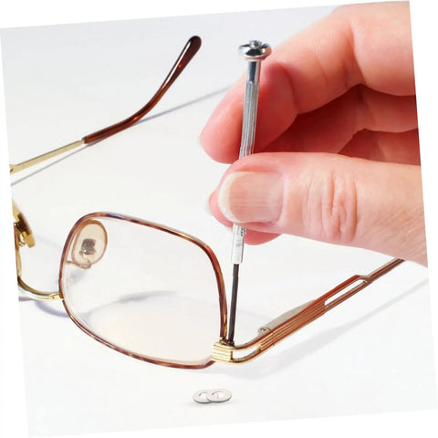 Using 200-Piece Eyewear Repair Kit With Metal Spacers And Washers For Quick Eyeglass Frame Repairs on brown glasses