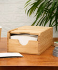 Spring Loaded Coffee Sleeve Dispenser For Homes And Restaurants Natural Bamboo Cup Sleeve Organizer on table with coffee cup