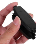 Hand holding a black component from 20 Pack ABS Plastic Enclosure Boxes for Electronics Projects PCB Housing Black with Easy Install and Multi Wiring Configs Durable Storage Case for DIY Mods and a Pro Look.