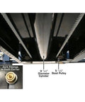 Close-up view of Heavy Duty Four Post Car Lift With Matching Sliding Jacks Black Powder Coated Steel showing zerk fittings and steel pulleys.