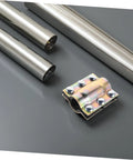 Leak Sealer Clamp For Plastic And Metal Pipes Waterproof Pipe Repair Kit on gray surface near metal pipes