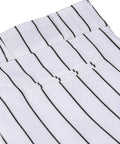 Close-up of Pro Weight Four Way Stretch 14 Ounce Tapered Baseball Pants For Adults in white with black pinstripes, TEK KNIT polyester.