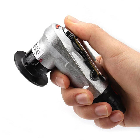Side view of a hand-held mini pneumatic chamfering tool with replaceable blades; silver metal body and black dial
